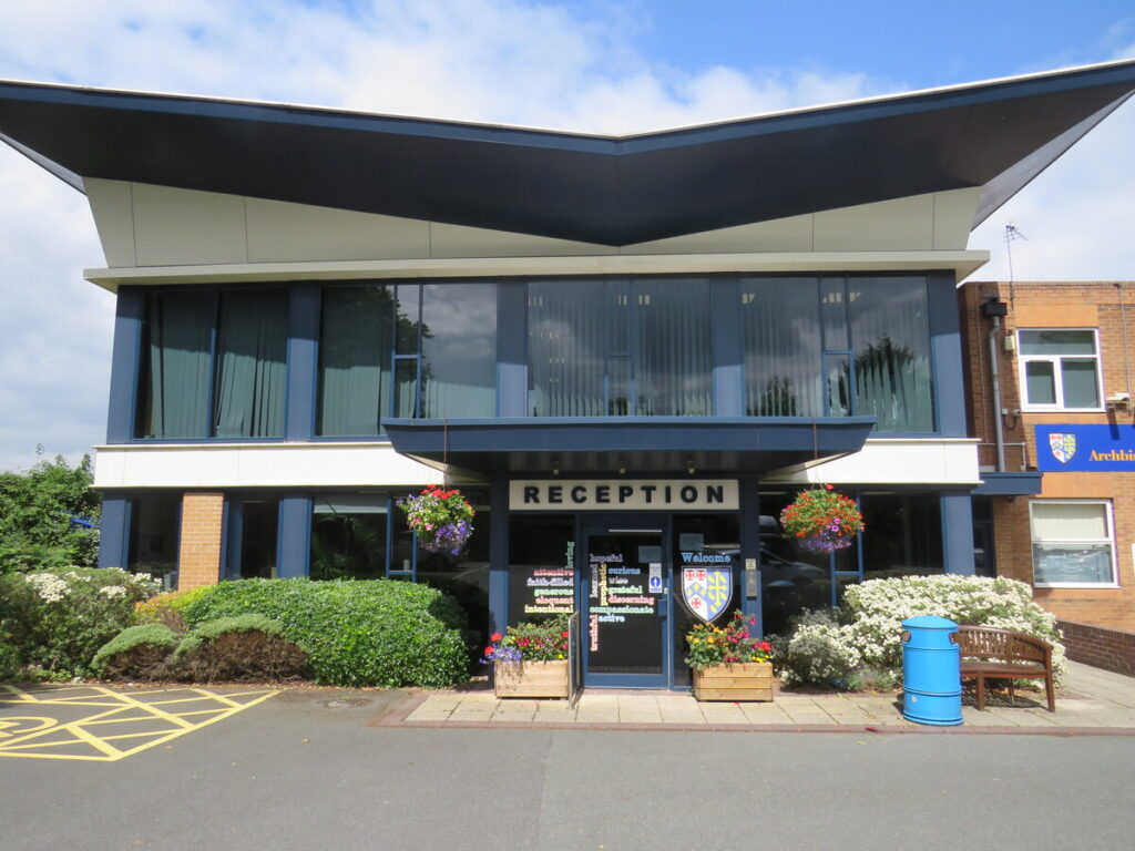 Archbishop Ilsley Catholic school and sixth form school's reception entrance of the building, outside.