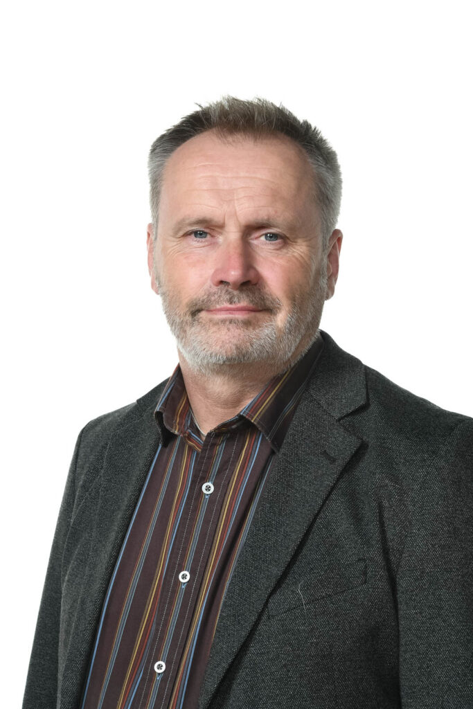 Portrait headshot photo of Mr A Morris, assistant headteacher. White background.