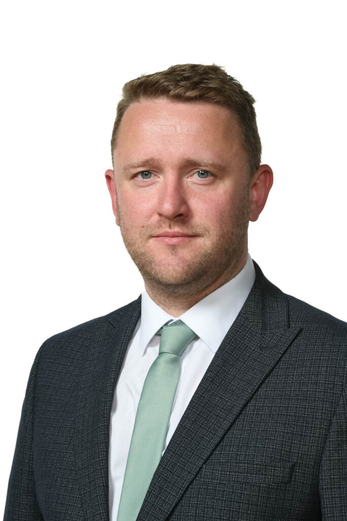 Portrait headshot photo of Peter Foley, Deputy Headteacher. White background.