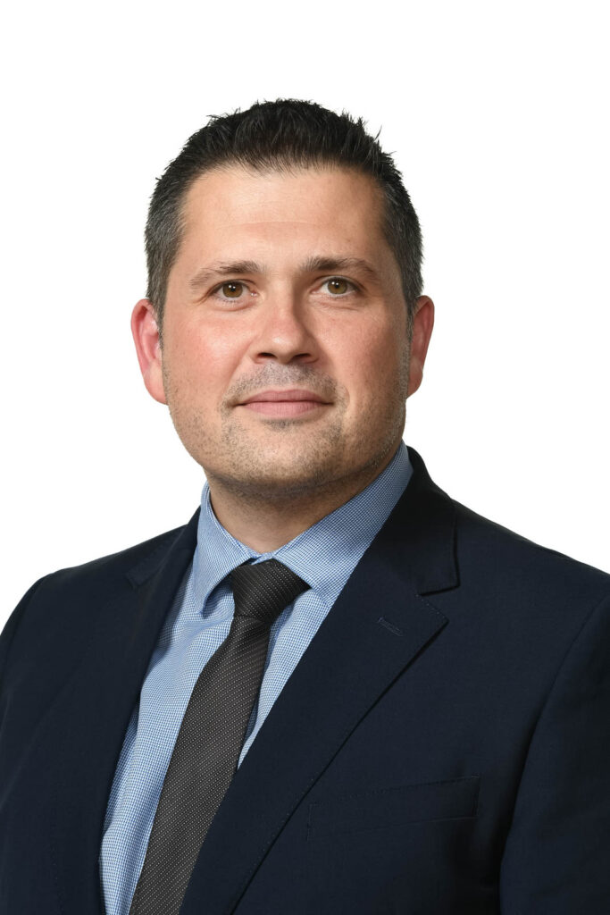 Portrait headshot photo of Pete McDonald, assistant headteacher in charge of data. White background.